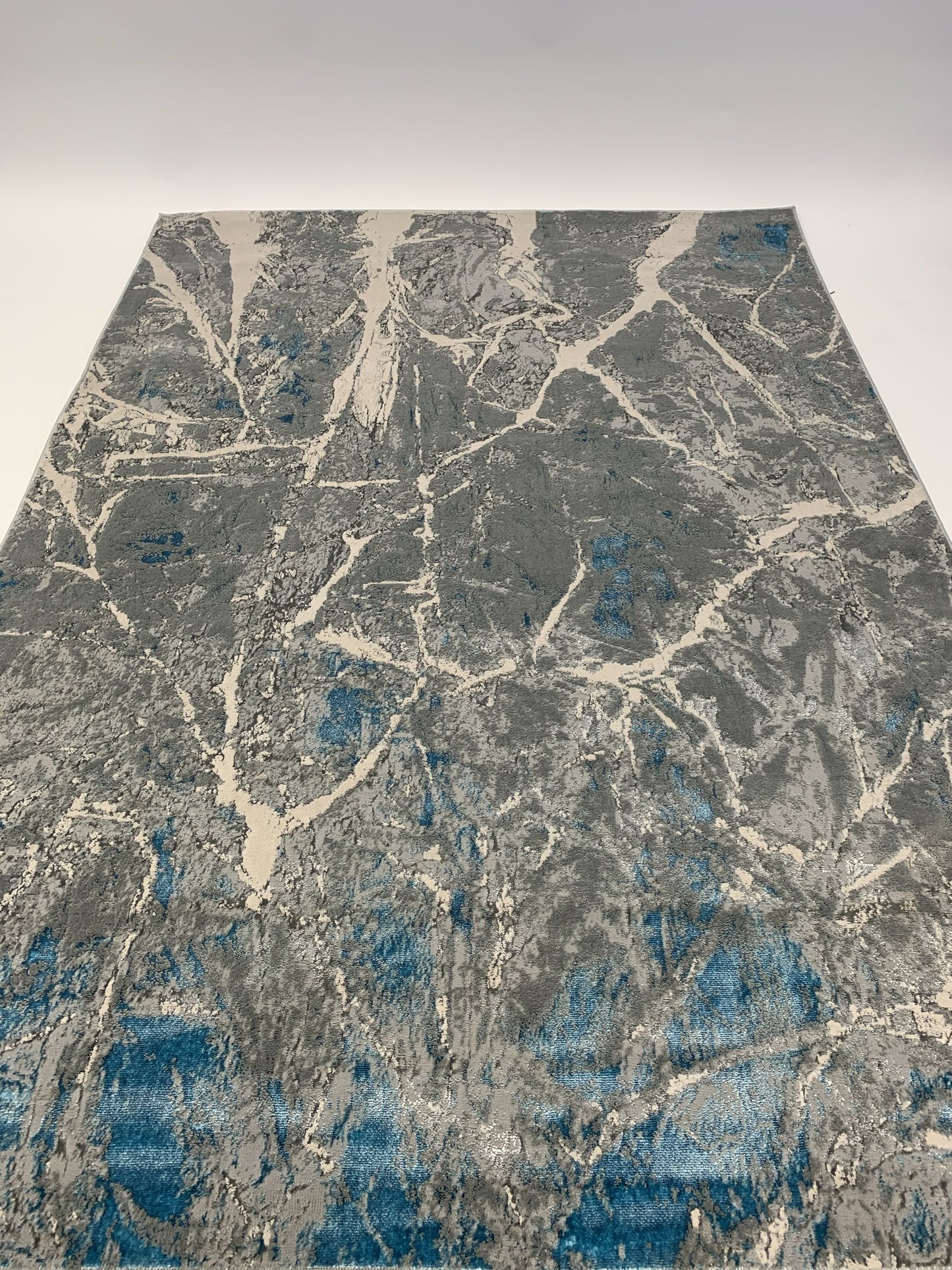 Abstract Blue/ Platinum Metallic Area Rug