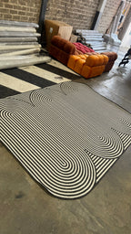 Black & Ivory Geometric Indoor/Outdoor Rug with Organic Live Edge.