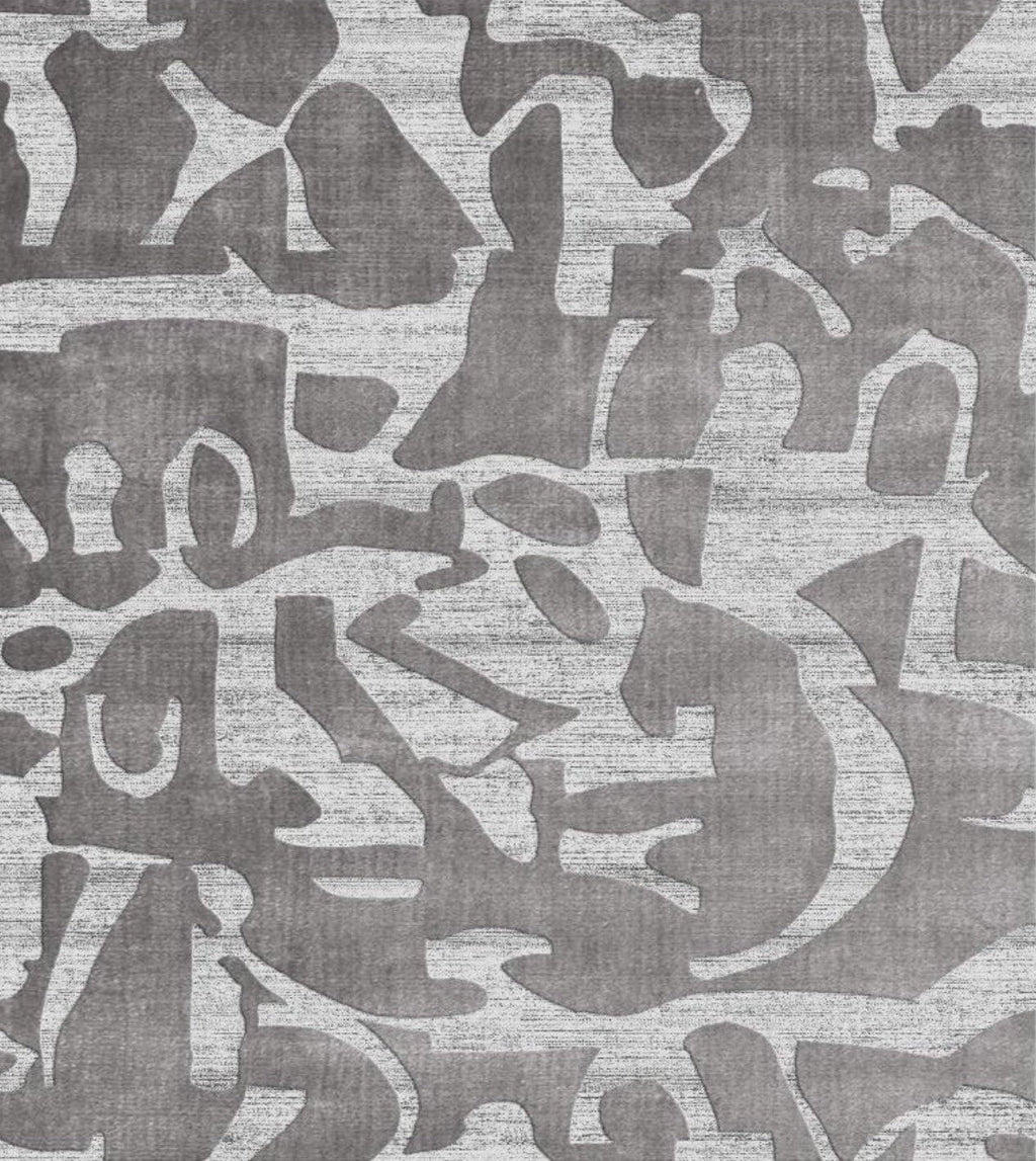 Patterned rug with abstract design in gray tones background