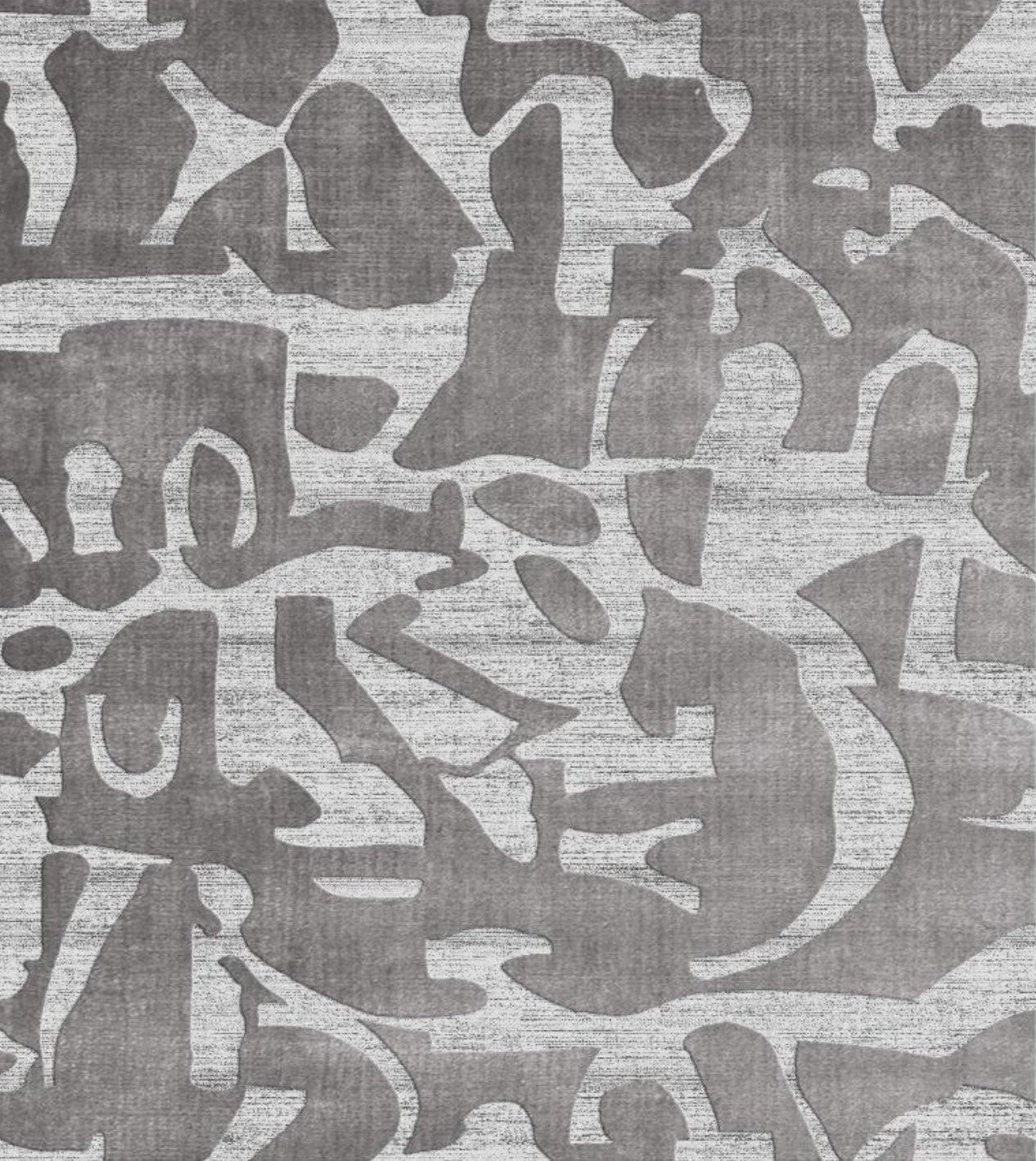 Patterned rug with abstract design in gray tones background