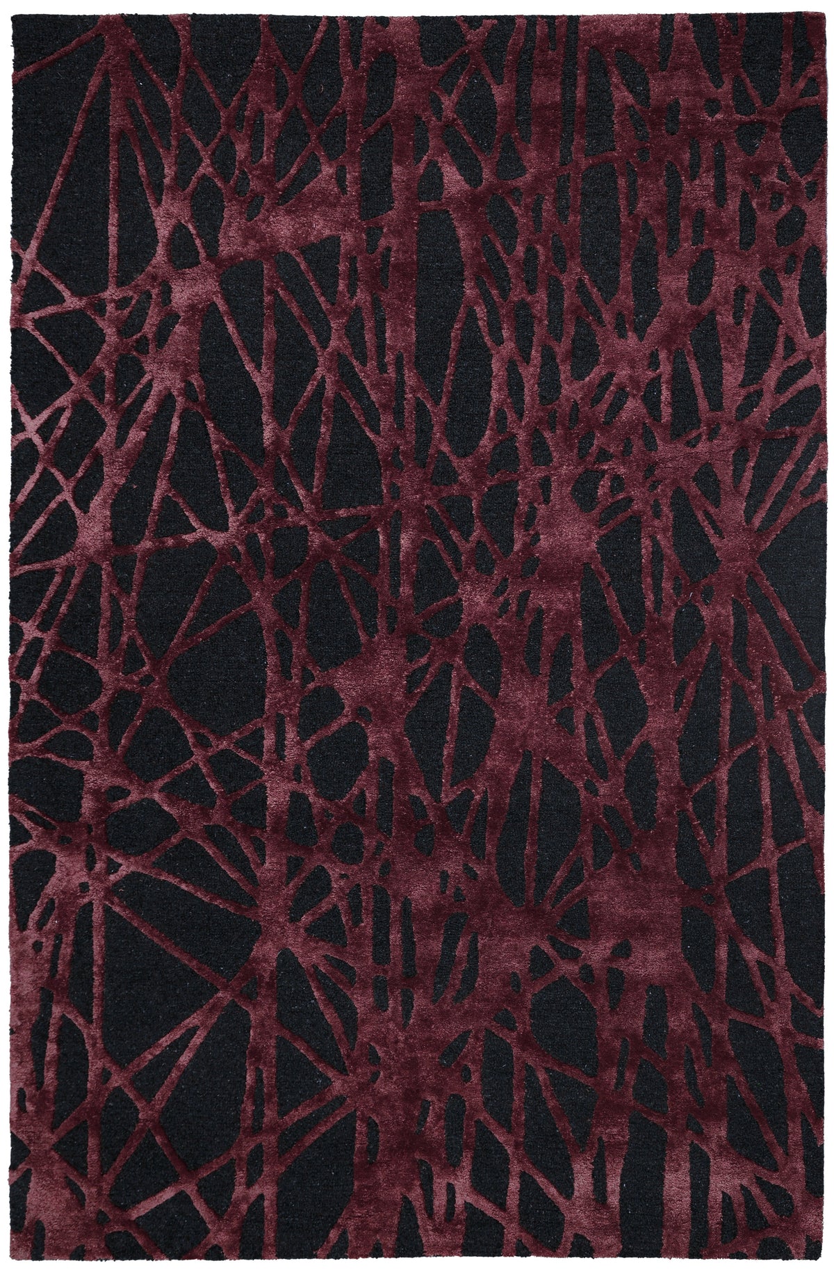 A rectangular area rug with an abstract, organic network pattern in deep burgundy over a black background.