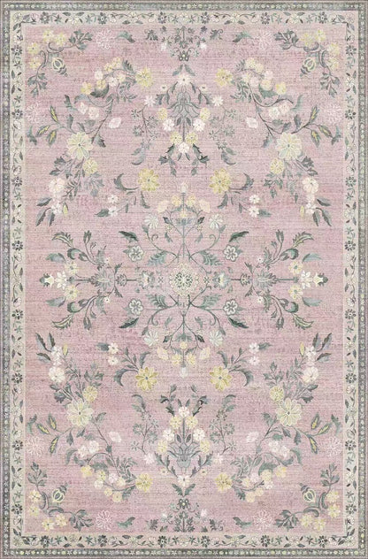Floral patterned rug with a pink background