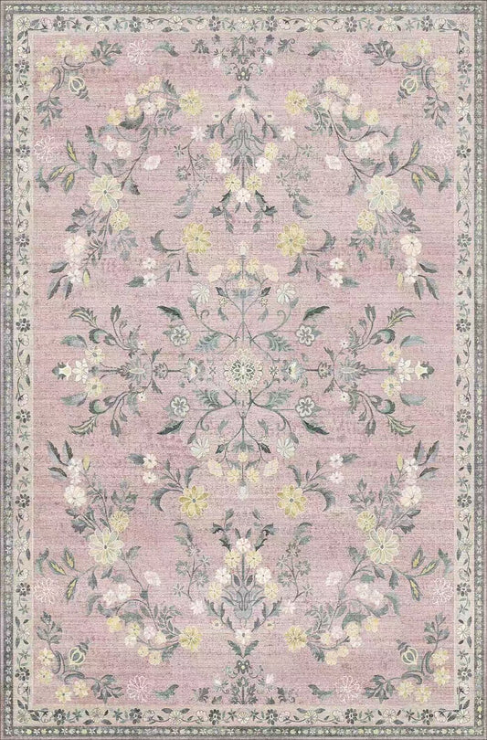 Floral patterned rug with a pink background