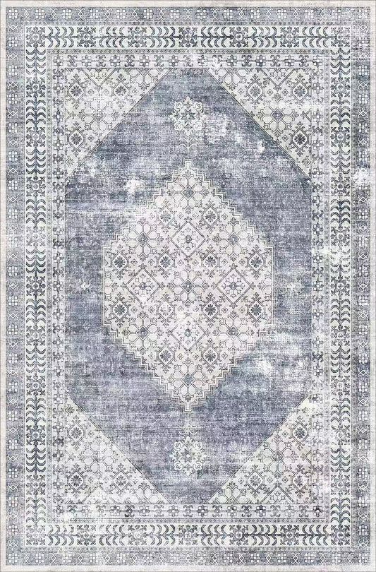 Decorative rug with geometric pattern in blue and gray tones