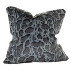 Decorative pillow with a gray and black pattern on a white background