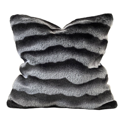 Decorative pillow with stripe pattern on a white background