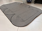 Black & Ivory Geometric Indoor/Outdoor Rug with Organic Live Edge.