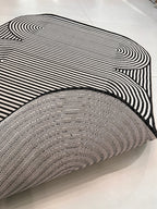 Black & Ivory Geometric Indoor/Outdoor Rug with Organic Live Edge.