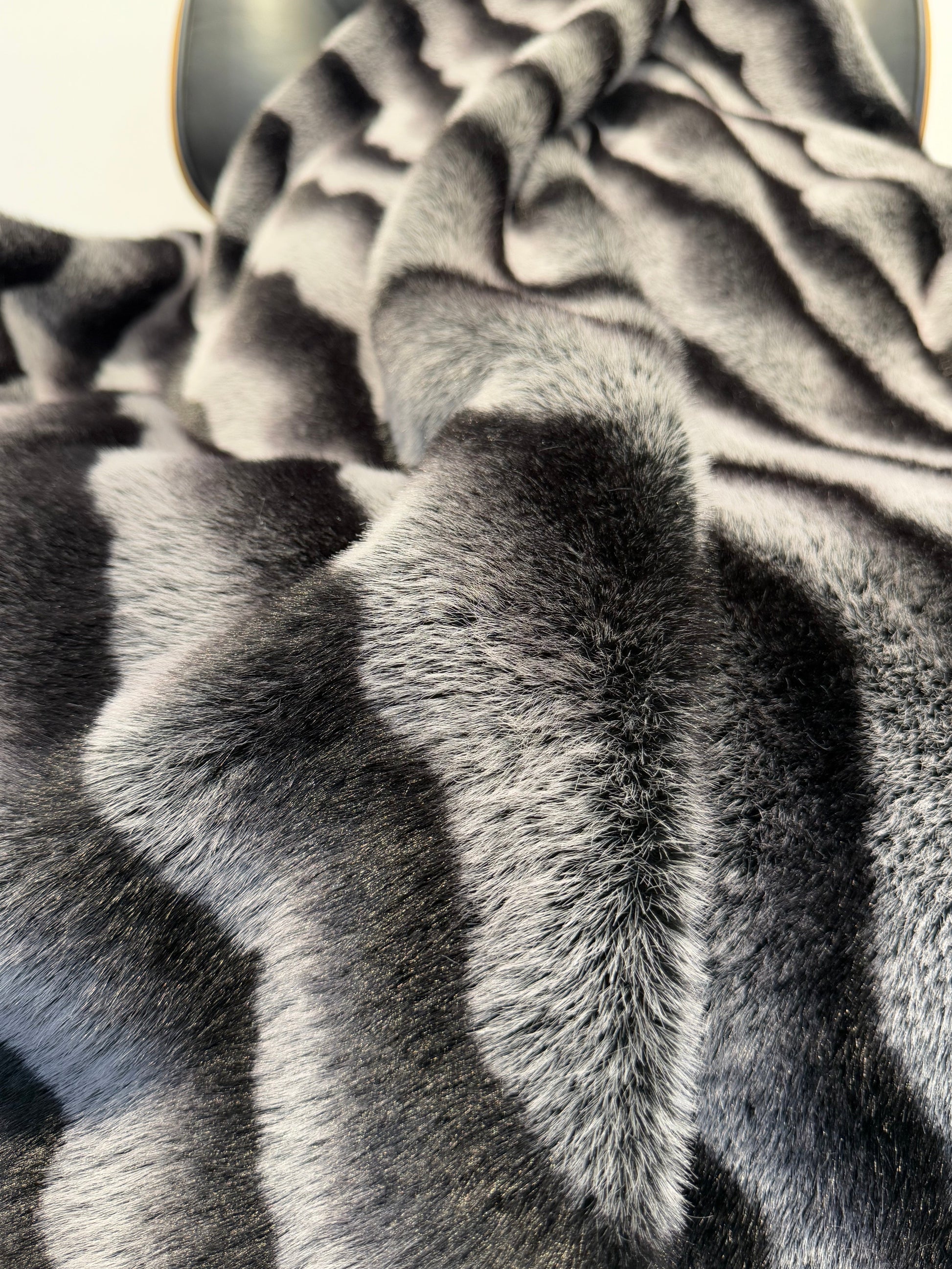 Close-up of a textured gray fabric with a pattern