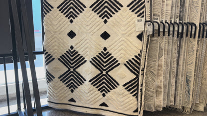 Soft Cream Rug with Beige Tones and Bohemian Black & Brown High-Low Motif - TIA 107.