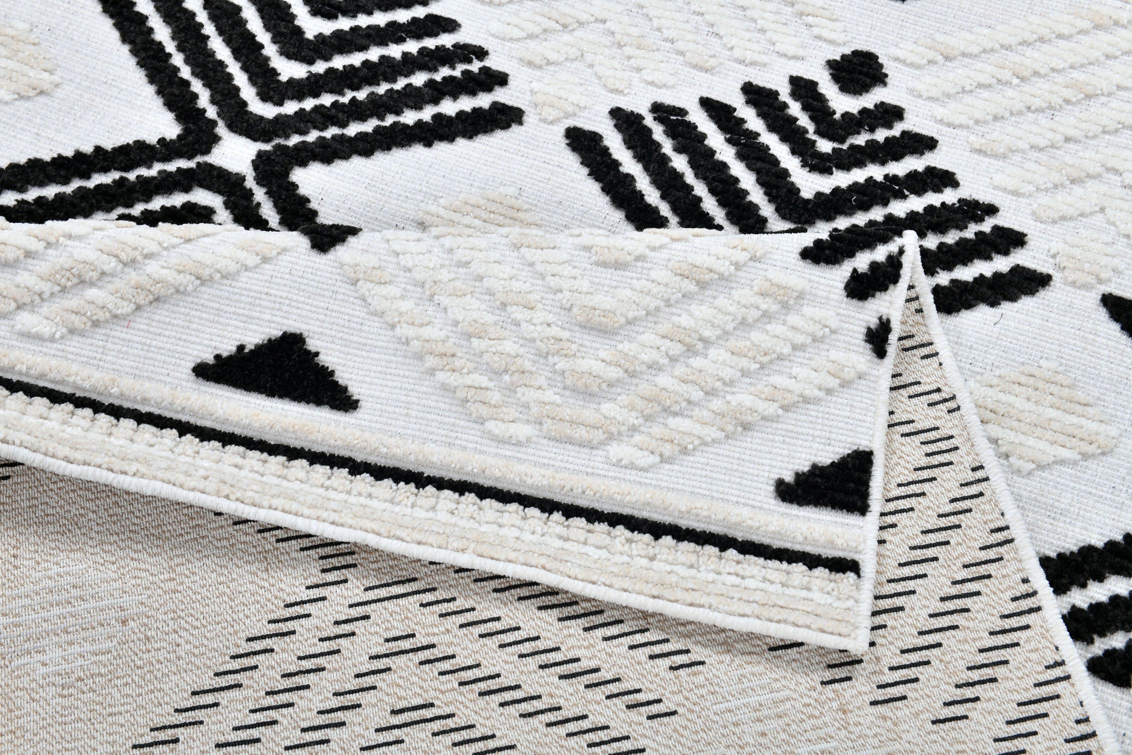 Soft Cream Rug with Beige Tones and Bohemian Black & Brown High-Low Motif - TIA 107.