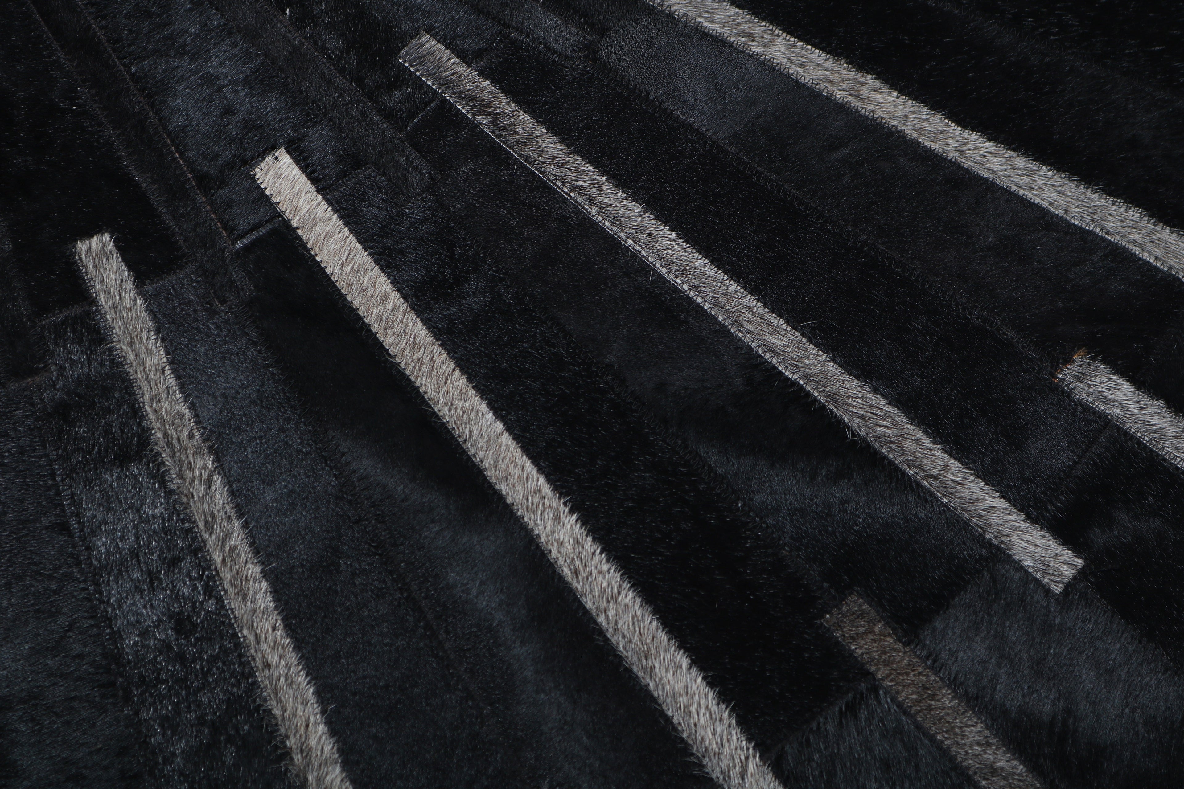 Geometric Round Cowhide Patchwork Rug – Black with Charcoal Stripes - Patchwork PCH216 Round