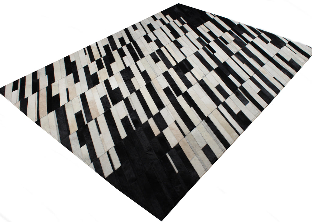 Handmade Black/White Patchwork Cowhide Area Rug