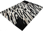 Handmade Black/White Patchwork Cowhide Area Rug