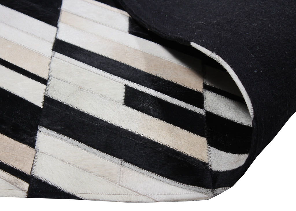Handmade Black/White Patchwork Cowhide Area Rug