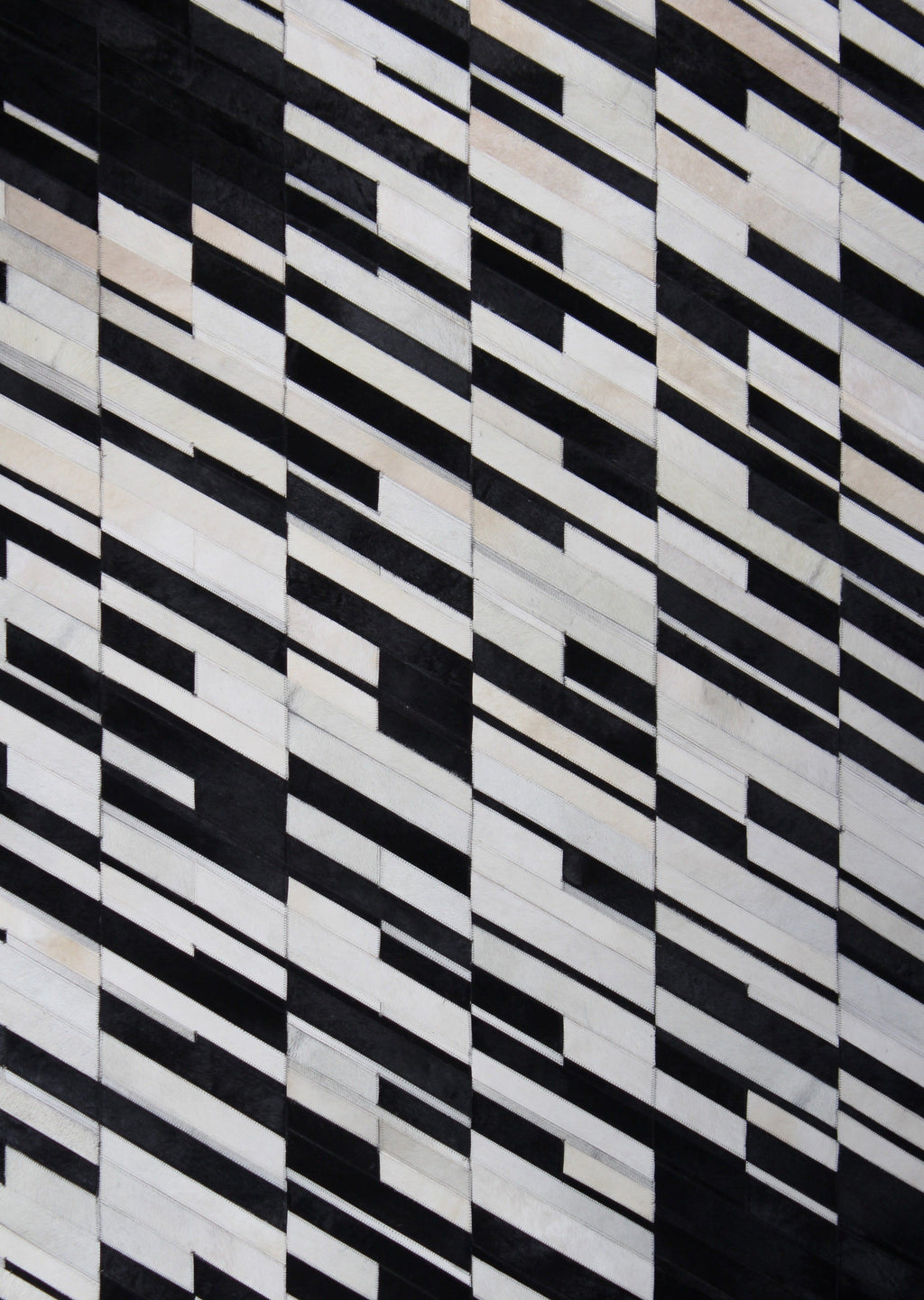 Handmade Black/White Patchwork Cowhide Area Rug