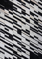 Handmade Black/White Patchwork Cowhide Area Rug
