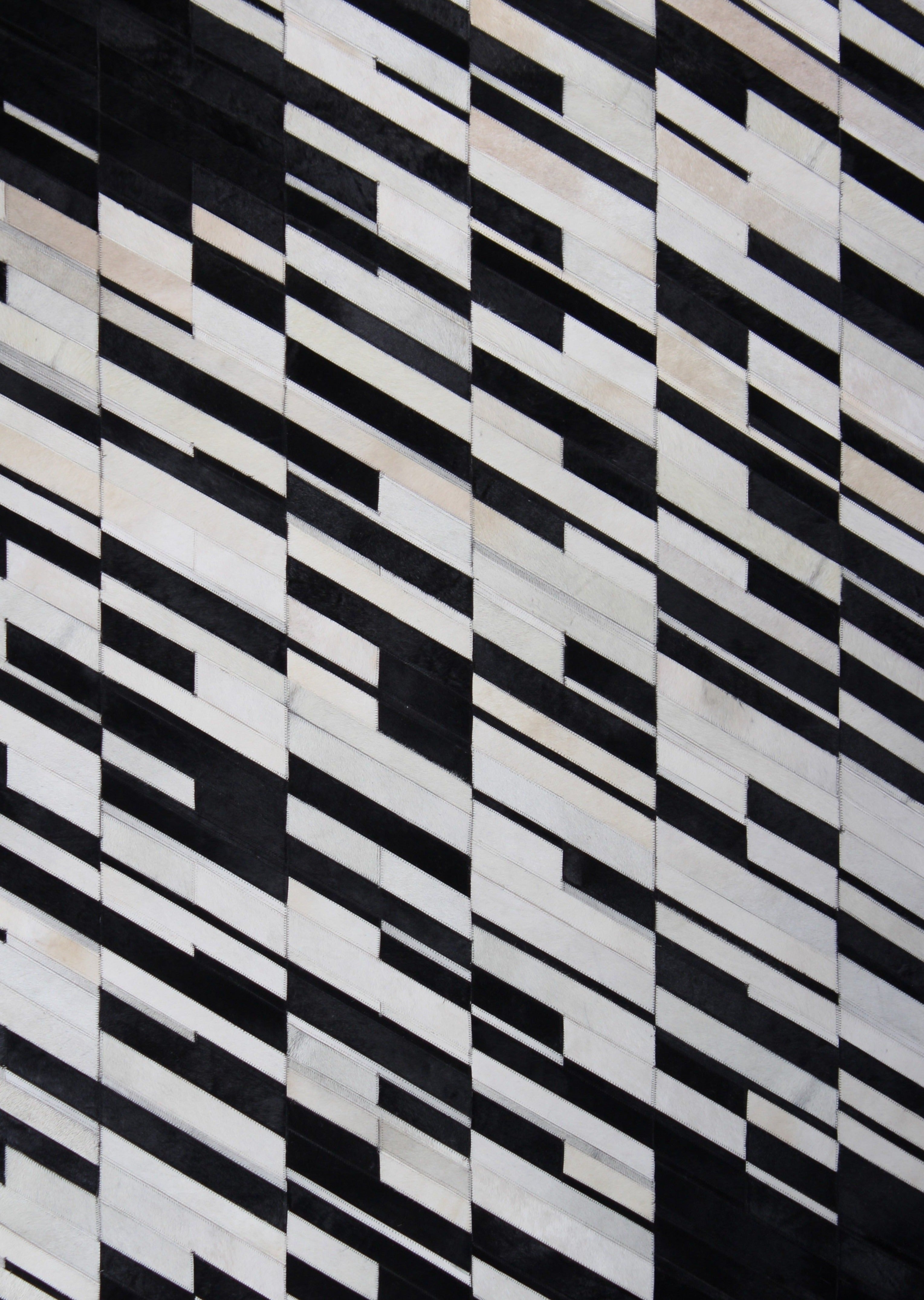 Handmade Black/White Patchwork Cowhide Area Rug