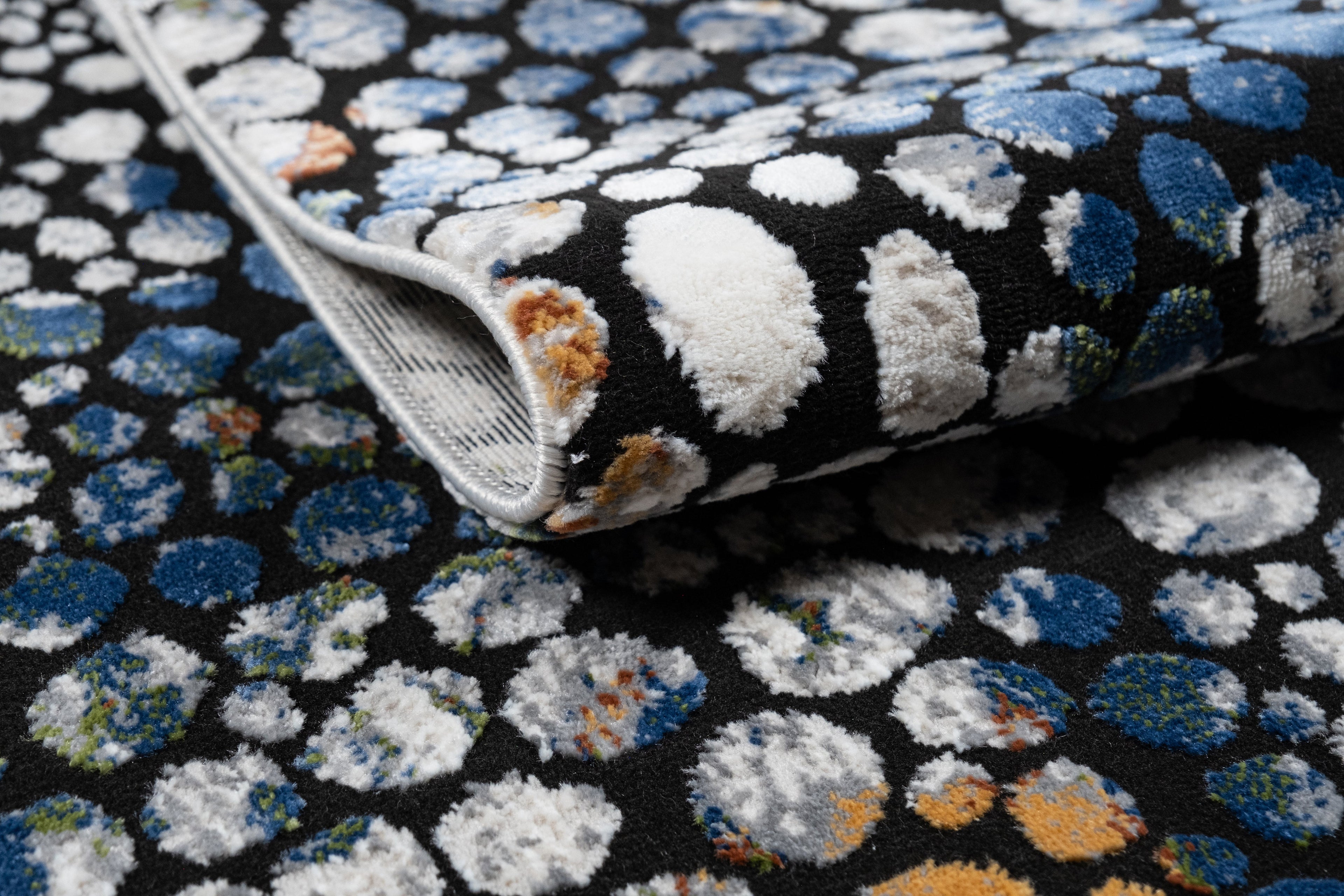 Abstract Spotted Rug – Black with Silver, Charcoal, Red-Brown, Mustard, Green, and Deep Blue Highlights.