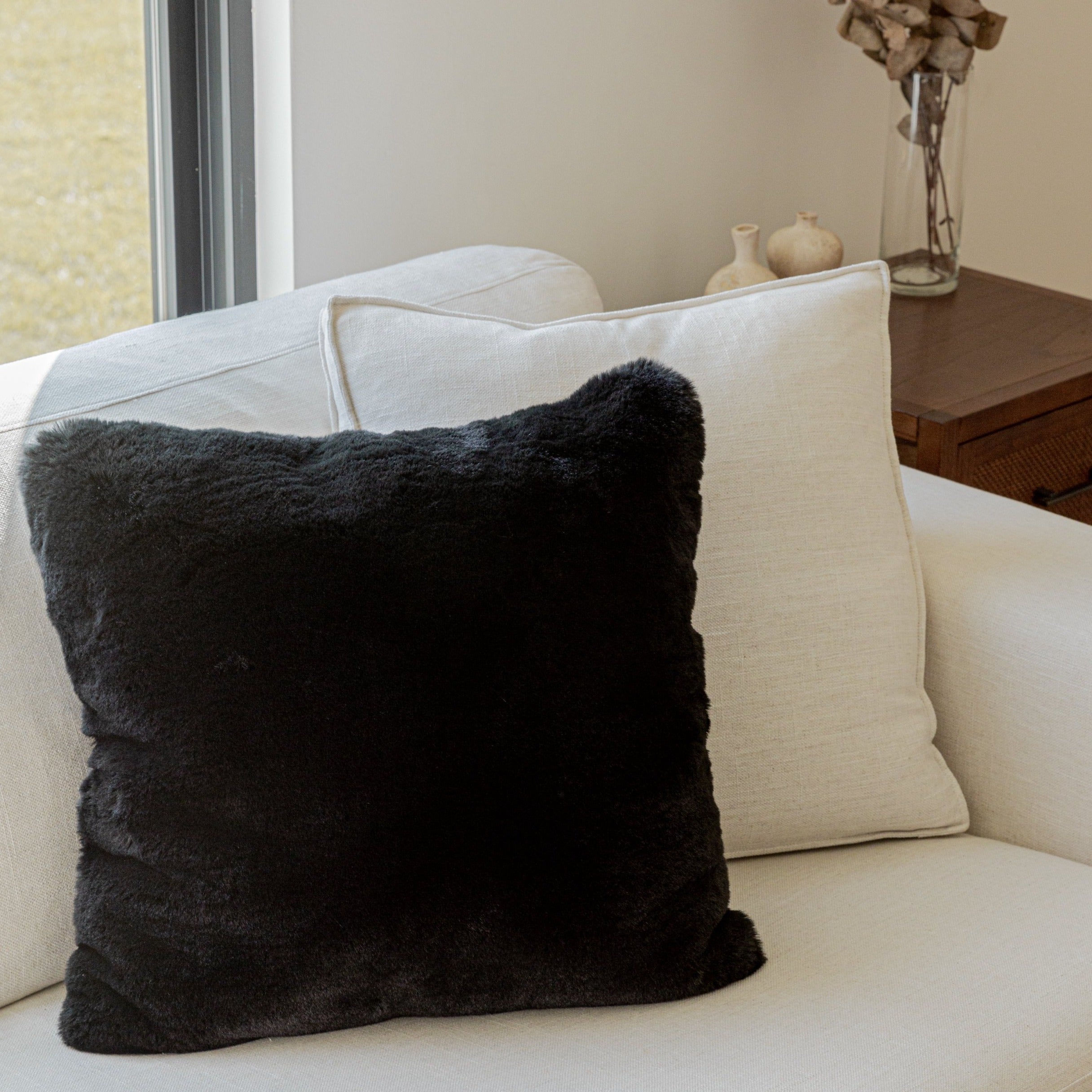 Black fluffy throw clearance pillows